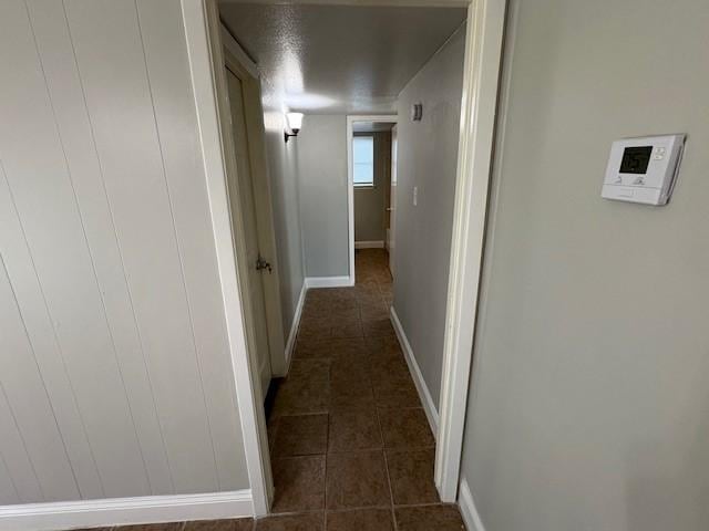 12127 Rhinebeck Dr, Houston, TX 77089 - corridor featuring dark tile patterned flooring