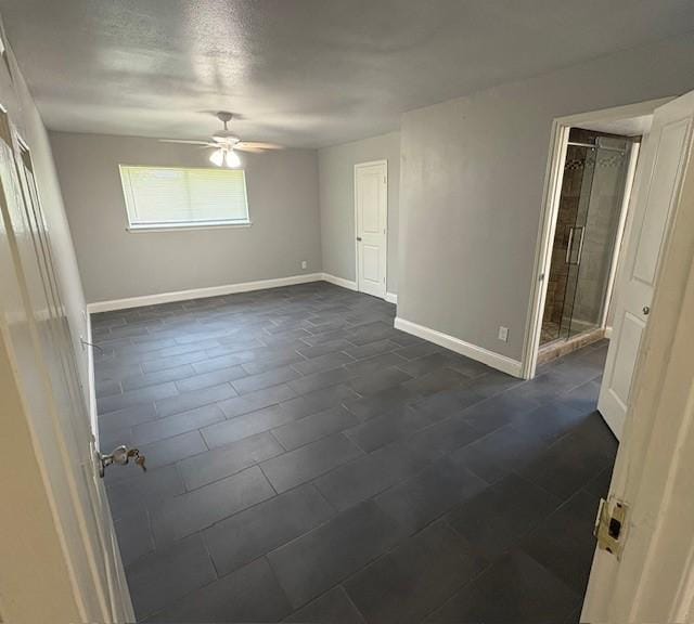 12127 Rhinebeck Dr, Houston, TX 77089 - empty room with ceiling fan and baseboards