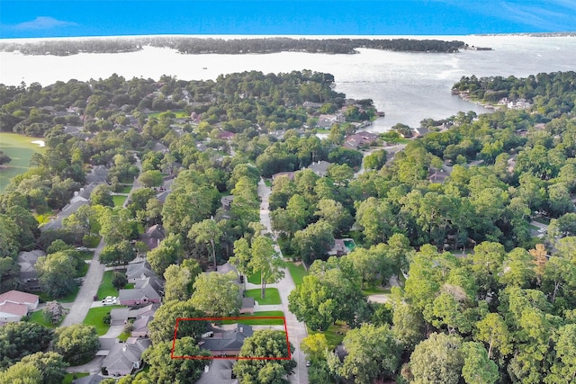 116 April Wind Dr E, Montgomery, TX 77356 - aerial view of property and surrounding area featuring a large body of water and property parcel outlined