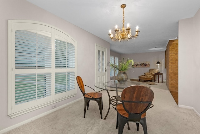 116 April Wind Dr E, Montgomery, TX 77356 - dining space with a chandelier and carpet floors