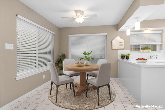 116 April Wind Dr E, Montgomery, TX 77356 - dining room with a ceiling fan and light tile patterned floors