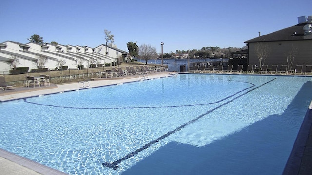 116 April Wind Dr E, Montgomery, TX 77356 - community pool with a patio