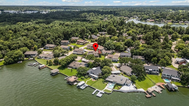 17 Lakeview Vlg, Montgomery, TX 77356 - aerial perspective of suburban area featuring a forest and a nearby body of water