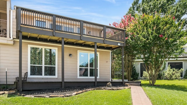 17 Lakeview Vlg, Montgomery, TX 77356 - back of property with a lawn and a deck