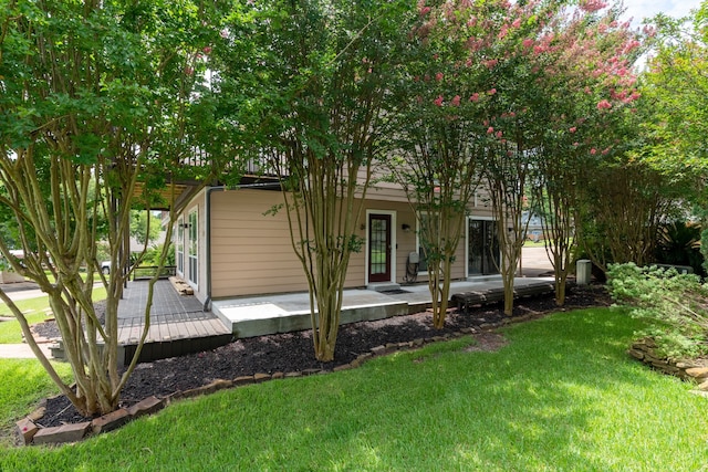 17 Lakeview Vlg, Montgomery, TX 77356 - back of house featuring a yard and a porch