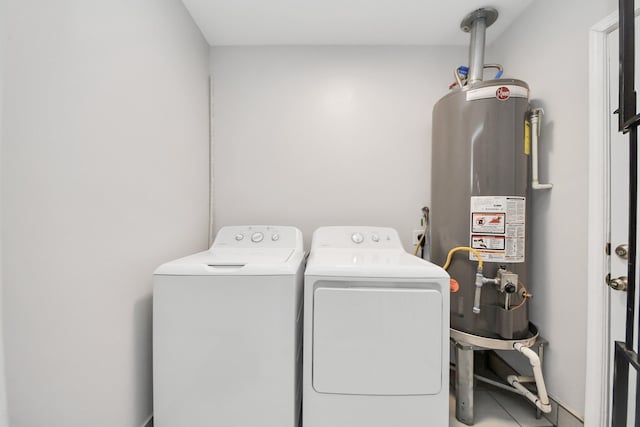 3603 Idaho St, Houston, TX 77021 - washroom featuring gas water heater and washer and dryer
