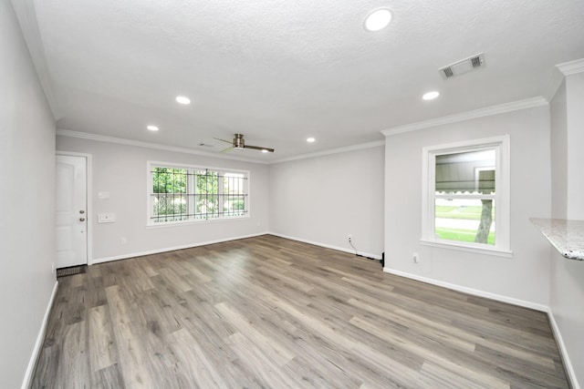 3603 Idaho St, Houston, TX 77021 - empty room with recessed lighting, wood finished floors, ceiling fan, and crown molding