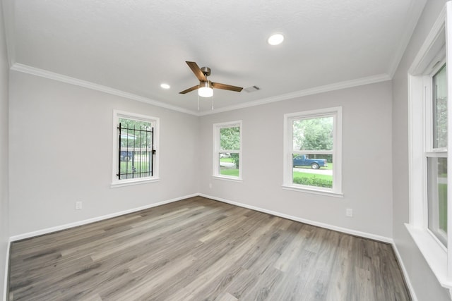 3603 Idaho St, Houston, TX 77021 - unfurnished room with wood finished floors, healthy amount of natural light, ceiling fan, ornamental molding, and recessed lighting