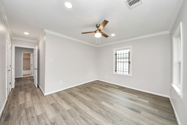3603 Idaho St, Houston, TX 77021 - unfurnished room with ceiling fan, recessed lighting, wood finished floors, and crown molding