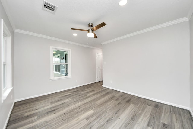 3603 Idaho St, Houston, TX 77021 - unfurnished room featuring a ceiling fan, wood finished floors, ornamental molding, and recessed lighting
