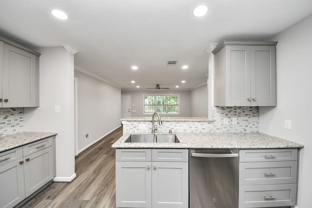 3603 Idaho St, Houston, TX 77021 - kitchen with dishwasher, gray cabinets, a ceiling fan, backsplash, and light wood-type flooring