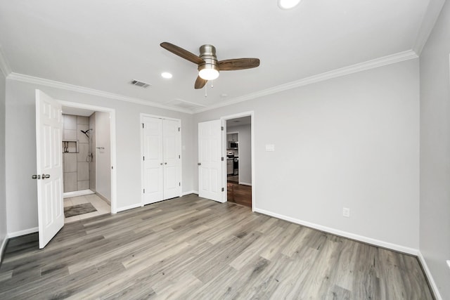 3603 Idaho St, Houston, TX 77021 - unfurnished bedroom with light wood-style flooring, crown molding, ensuite bath, a closet, and recessed lighting