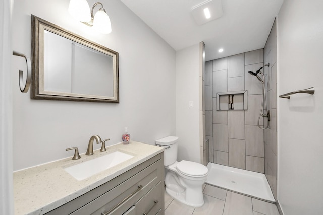 3603 Idaho St, Houston, TX 77021 - full bathroom featuring vanity, a tile shower, tile patterned floors, and recessed lighting