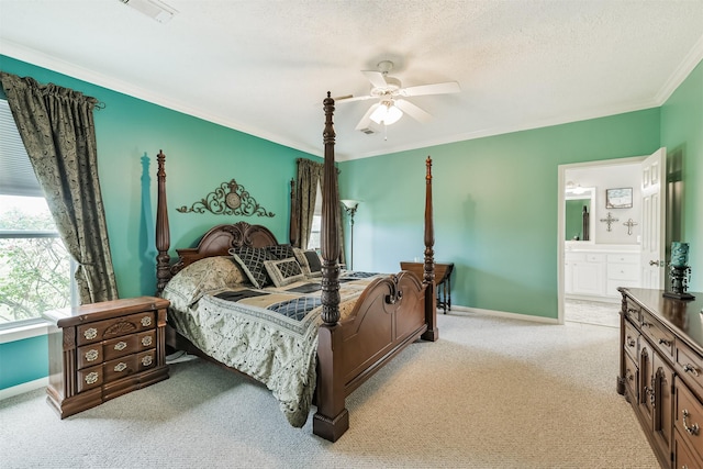 29218 Hay Meadow Ct, Waller, TX 77484 - bedroom featuring light colored carpet, ornamental molding, ensuite bath, ceiling fan, and a textured ceiling