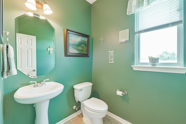 29218 Hay Meadow Ct, Waller, TX 77484 - half bathroom featuring plenty of natural light and tile patterned floors