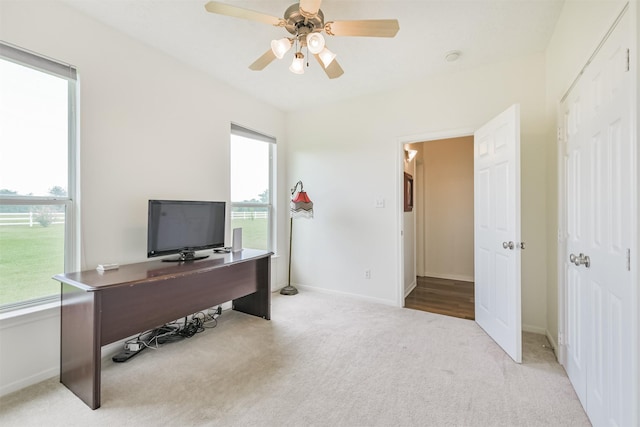 29218 Hay Meadow Ct, Waller, TX 77484 - home office featuring carpet flooring, healthy amount of natural light, and ceiling fan