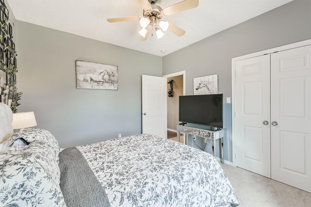 29218 Hay Meadow Ct, Waller, TX 77484 - bedroom with light carpet, a closet, and a ceiling fan