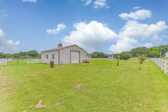 29218 Hay Meadow Ct, Waller, TX 77484 - view of yard with an outdoor structure and a detached garage