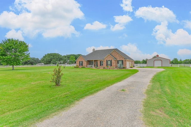 29218 Hay Meadow Ct, Waller, TX 77484 - view of front of house with an outdoor structure, gravel driveway, brick siding, a garage, and a chimney