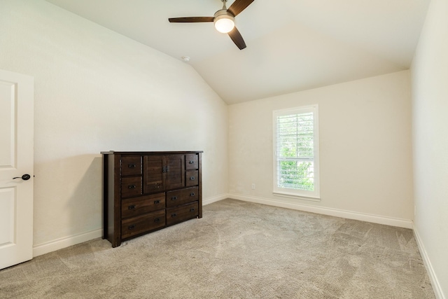 10318 Granite Ct, Iowa Colony, TX 77583 - unfurnished bedroom featuring vaulted ceiling, carpet flooring, and ceiling fan