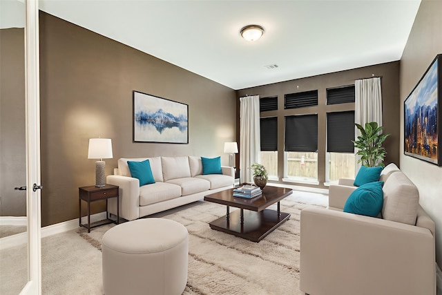 10318 Granite Ct, Iowa Colony, TX 77583 - carpeted living area featuring baseboards