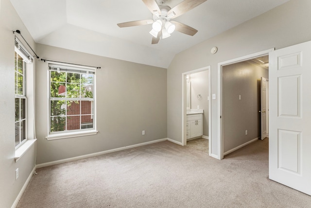 53 Silver Crescent Ct, The Woodlands, TX 77382 - unfurnished bedroom with lofted ceiling, light colored carpet, ensuite bathroom, and a ceiling fan