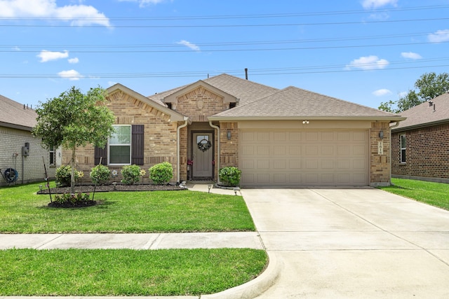 1618 William Scott St, Baytown, TX 77523 - ranch-style home with brick siding, driveway, a garage, a front lawn, and roof with shingles