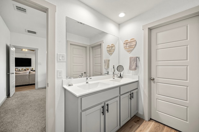 1618 William Scott St, Baytown, TX 77523 - ensuite bathroom featuring double vanity and ceiling fan