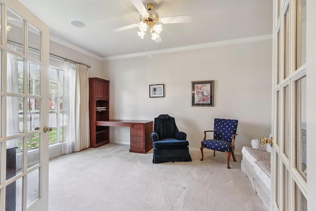15407 Copper Branch Ln, Houston, TX 77095 - sitting room featuring french doors, light carpet, ornamental molding, and healthy amount of natural light