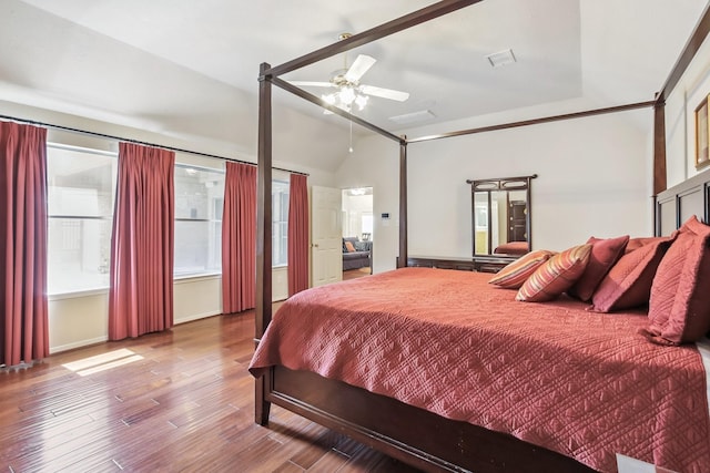 15407 Copper Branch Ln, Houston, TX 77095 - bedroom with lofted ceiling, wood finished floors, and a ceiling fan