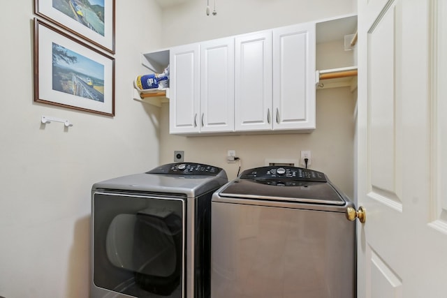 15407 Copper Branch Ln, Houston, TX 77095 - washroom featuring washing machine and clothes dryer and cabinet space