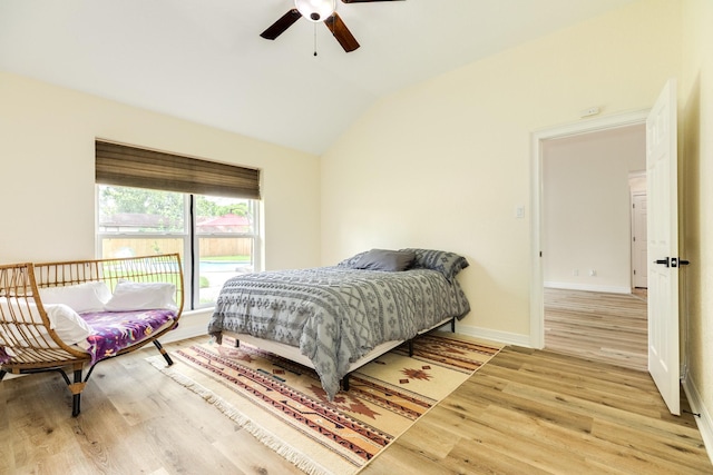 21 Alexander Ct, Angleton, TX 77515 - bedroom featuring light wood-type flooring, lofted ceiling, and ceiling fan