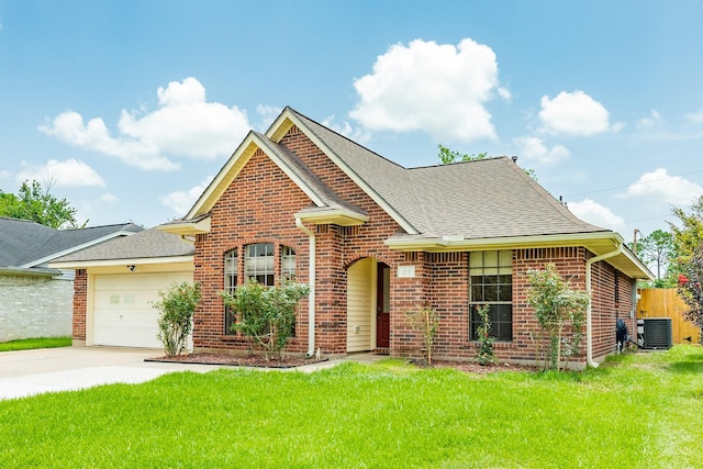 21 Alexander Ct, Angleton, TX 77515 - view of front of house with brick siding, driveway, and a shingled roof