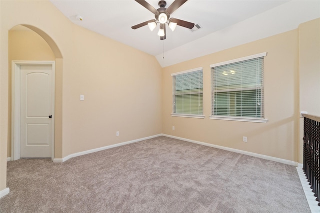 9 Cheswood Manor Dr, Spring, TX 77382 - unfurnished room featuring carpet floors, a ceiling fan, arched walkways, a smoke detector, and lofted ceiling