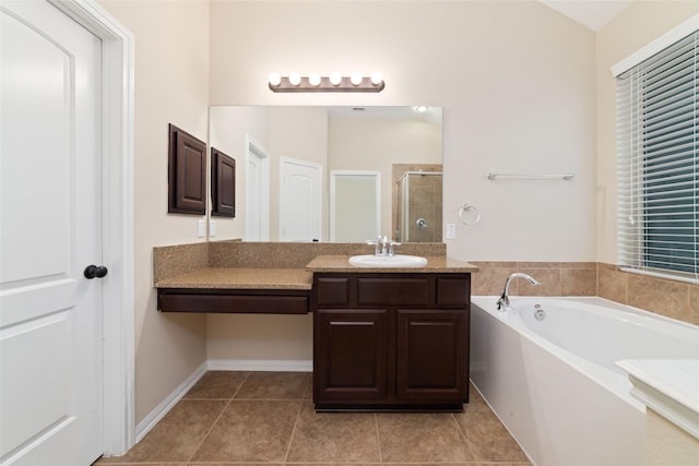 9 Cheswood Manor Dr, Spring, TX 77382 - full bath with vanity, a stall shower, a garden tub, and tile patterned flooring