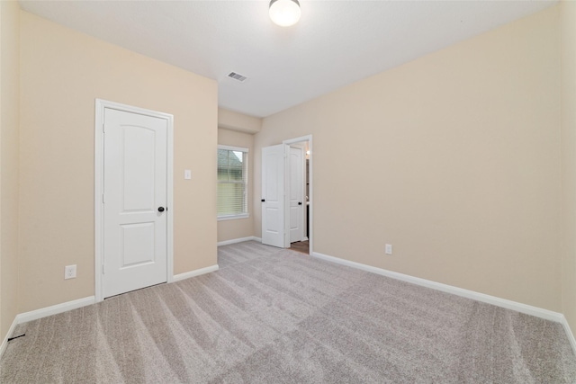 9 Cheswood Manor Dr, Spring, TX 77382 - unfurnished bedroom featuring light colored carpet and baseboards