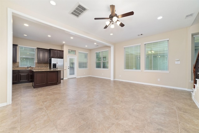 9 Cheswood Manor Dr, Spring, TX 77382 - unfurnished living room featuring a ceiling fan, recessed lighting, and light tile patterned floors