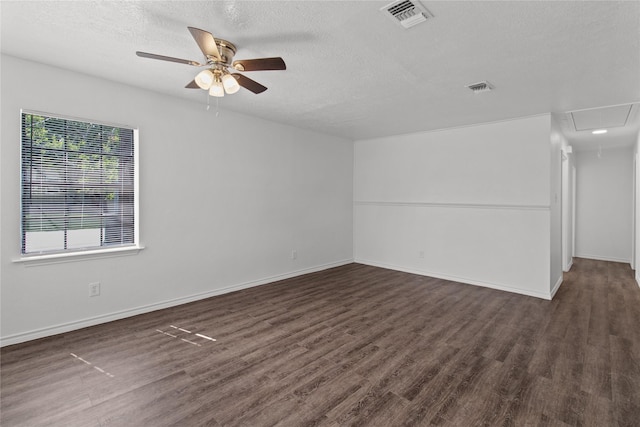 805 28 1/2, San Leon, TX 77539 - unfurnished room featuring attic access, ceiling fan, wood finished floors, and a textured ceiling