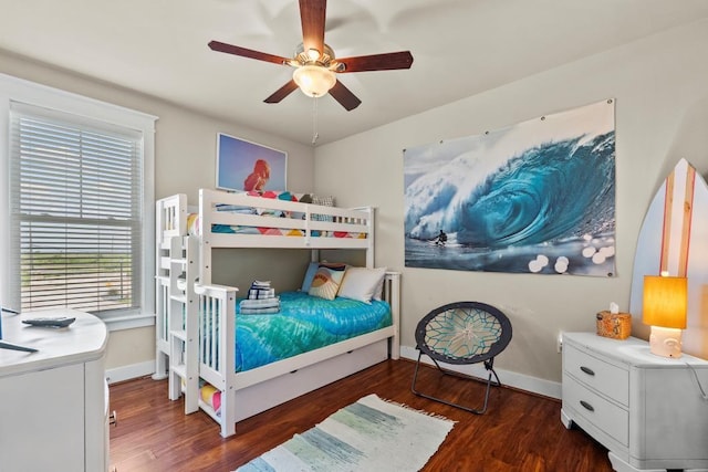 4121 Pointe W Dr Unit 103, Galveston, TX 77554 - bedroom with wood finished floors and ceiling fan