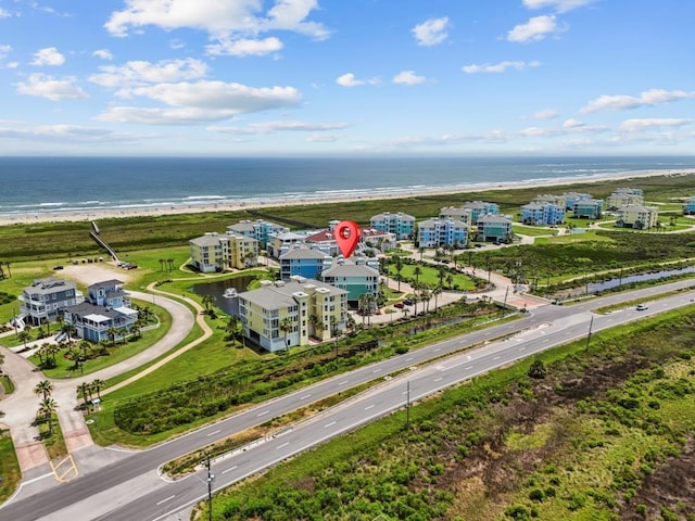4121 Pointe W Dr Unit 103, Galveston, TX 77554 - bird's eye view of waterfront with a beach