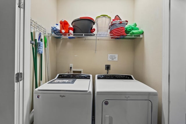 4121 Pointe W Dr Unit 103, Galveston, TX 77554 - laundry room with independent washer and dryer