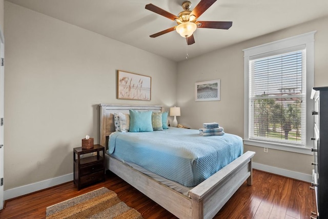 4121 Pointe W Dr Unit 103, Galveston, TX 77554 - bedroom with wood finished floors and ceiling fan