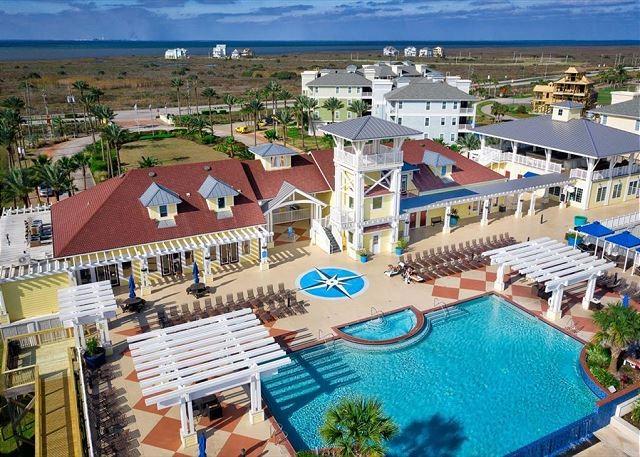 4121 Pointe W Dr Unit 103, Galveston, TX 77554 - community pool featuring a pergola and a patio