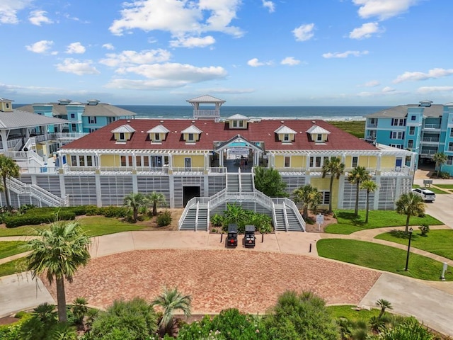 4121 Pointe W Dr Unit 103, Galveston, TX 77554 - exterior space with a water view and stairs