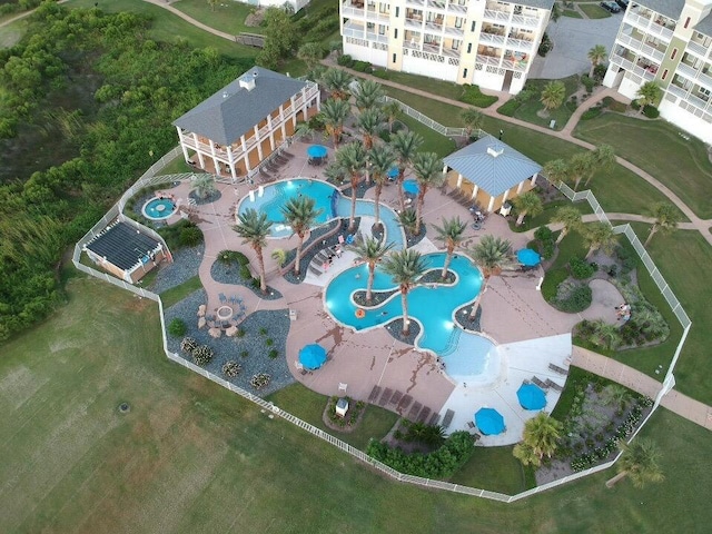 4121 Pointe W Dr Unit 103, Galveston, TX 77554 - aerial view of property and surrounding area featuring a pool