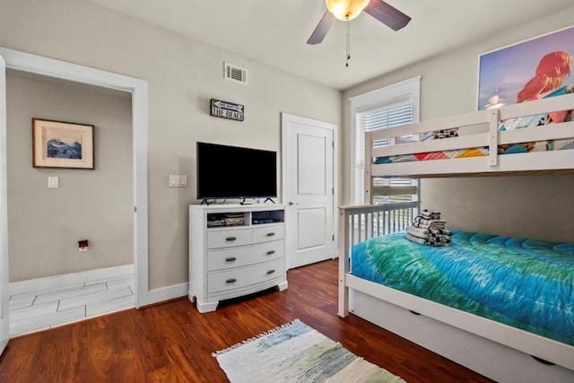 4121 Pointe W Dr Unit 103, Galveston, TX 77554 - bedroom with wood finished floors and a ceiling fan