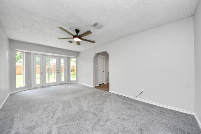 17715 Glenpatti Dr, Houston, TX 77084 - empty room with ceiling fan, carpet flooring, and a textured ceiling