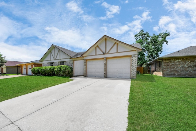 17715 Glenpatti Dr, Houston, TX 77084 - english style home with concrete driveway, an attached garage, a front lawn, and brick siding