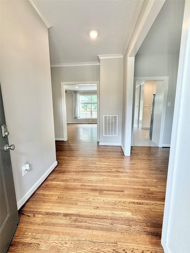 11418 Braewick Dr, Houston, TX 77035 - corridor featuring ornamental molding and light wood-style floors