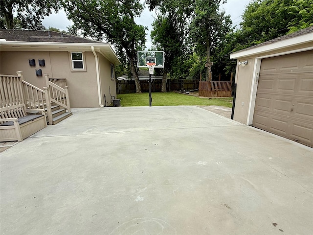 11418 Braewick Dr, Houston, TX 77035 - view of patio / terrace with a garage and concrete driveway